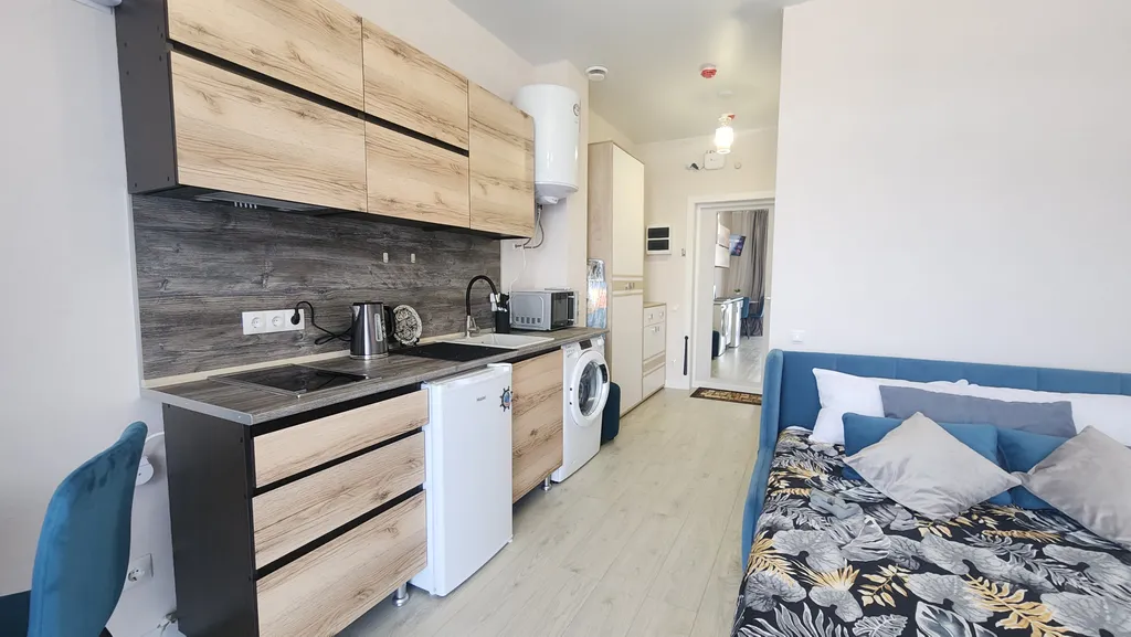 Уютная студия в корпусе с бассейном