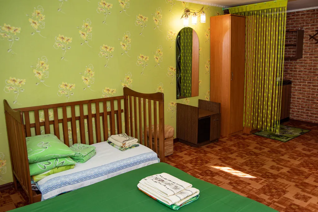 Семейные апартаменты с отдельным уютным двориком