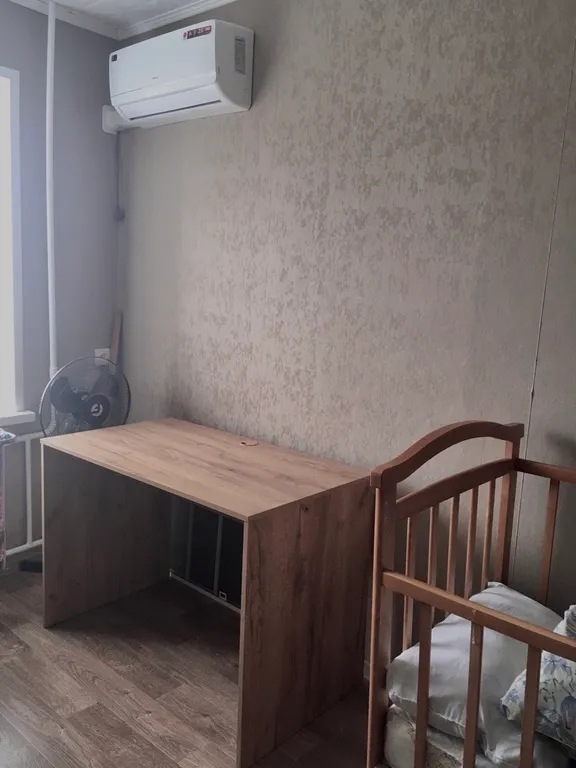 Уютная квартира с кроваткой для младенца