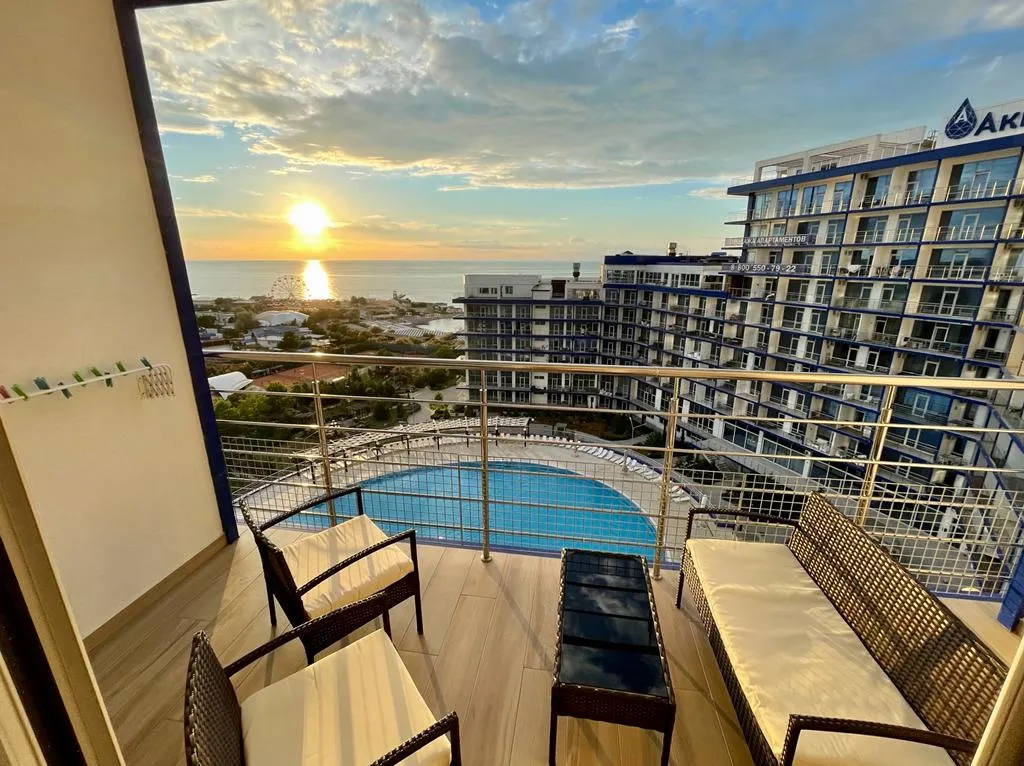 Апартаменты с видом на морской закат и бассейн