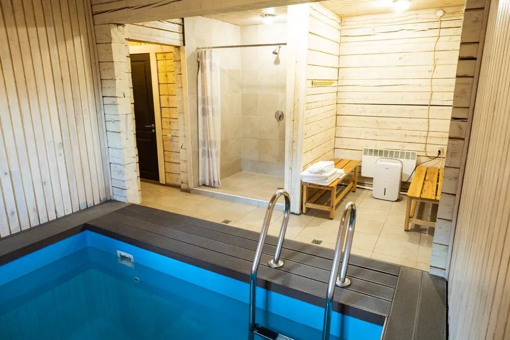 Коттедж с сауной и бассейном