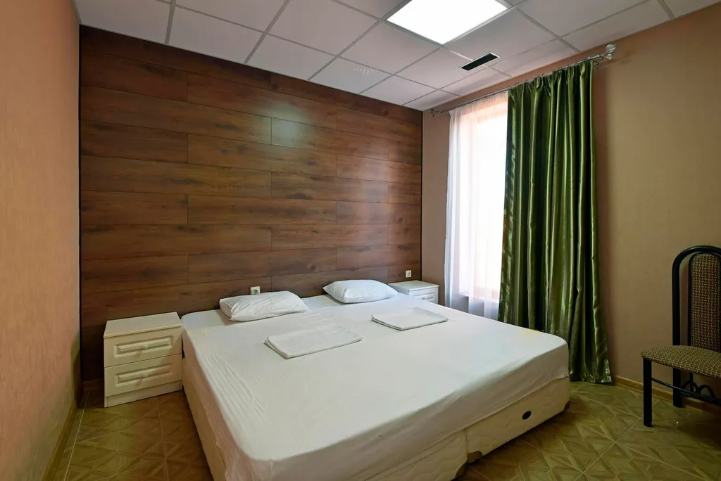 Квартира Уютный двухкомнатный семейный номер на первом этаже — аренда посуточно в Пересыпь