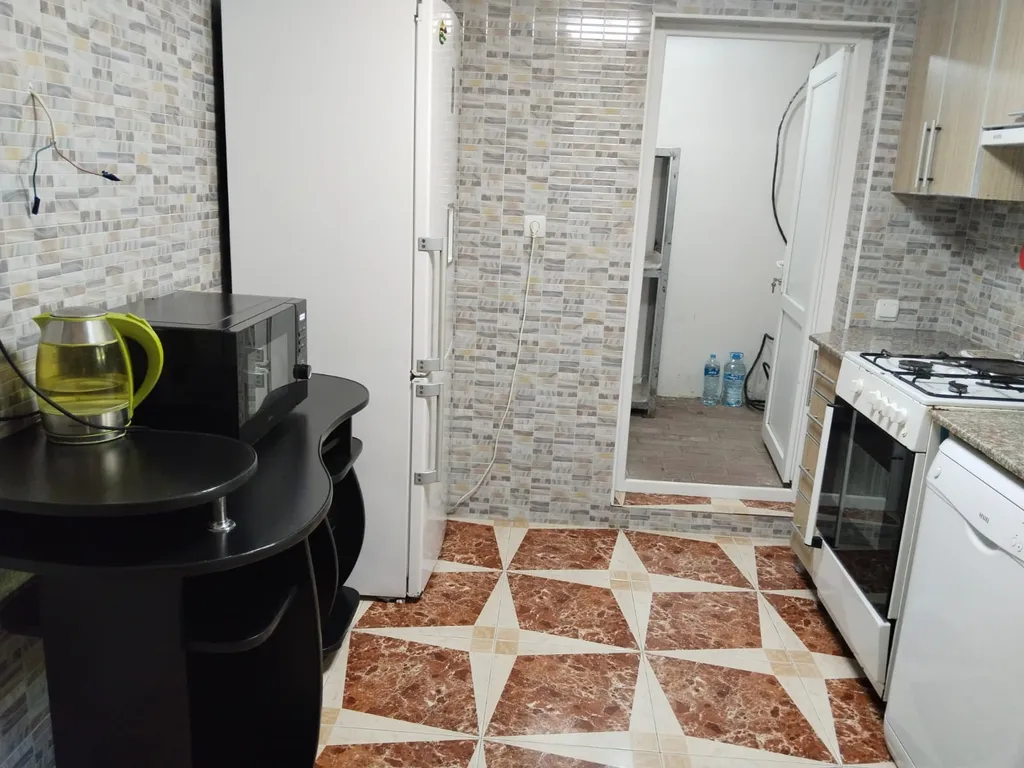 Апартаменты с большой кухней и выходом во двор