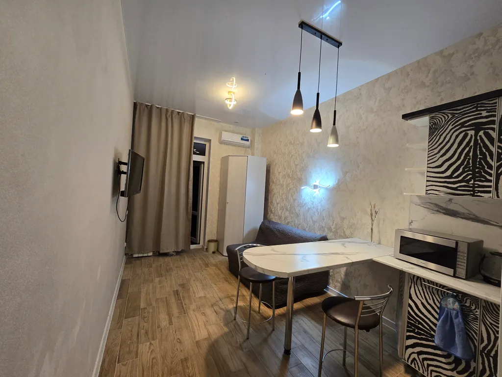 Уютная студия с индивидуальным входом и площадкой для отдыха