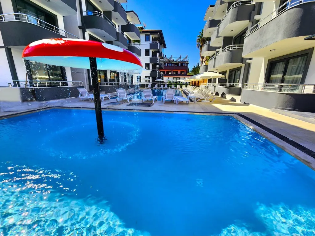 Квартира в центре Сиде внутри комплекса с бассейном