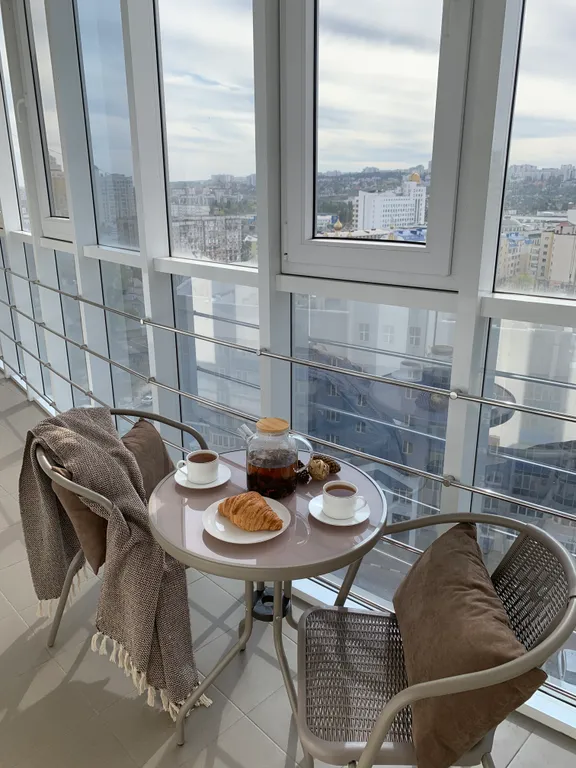 Просторная и теплая квартира с панорамным видом в центре города