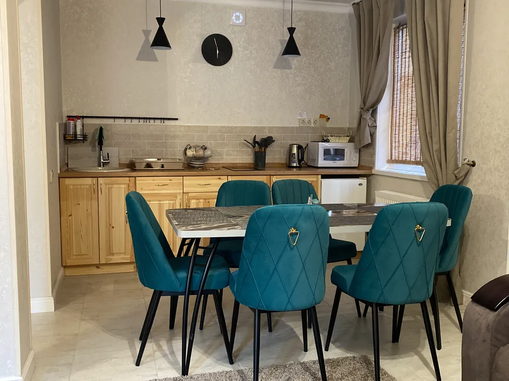 Malkar house с видом на гору Чегет