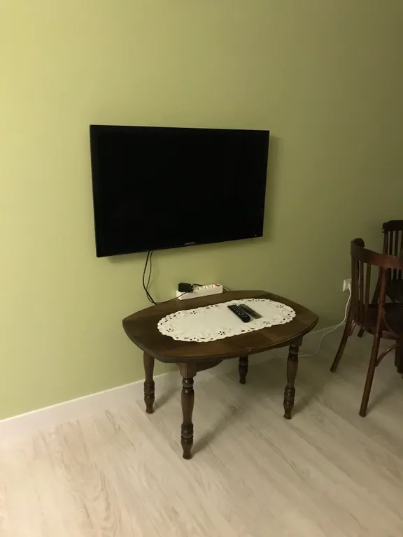 Квартира с зелёной гостиной