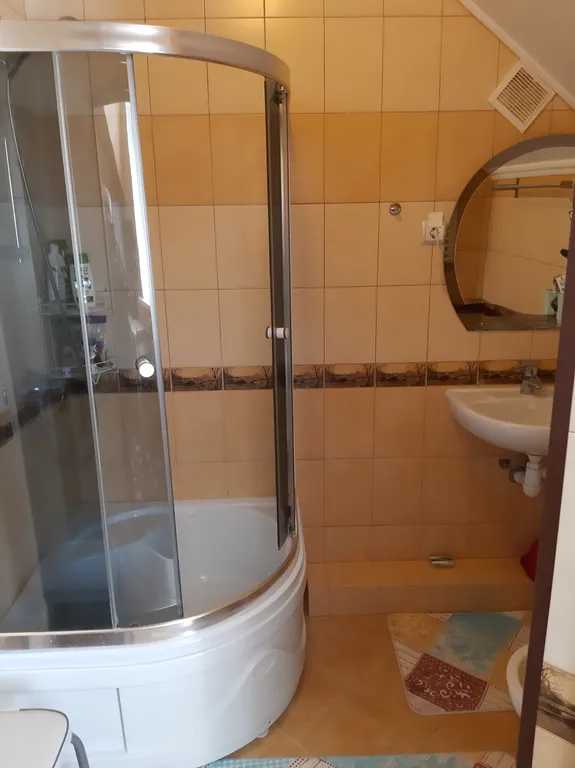 Уютная комната в трёхэтажной квартире в западной части города