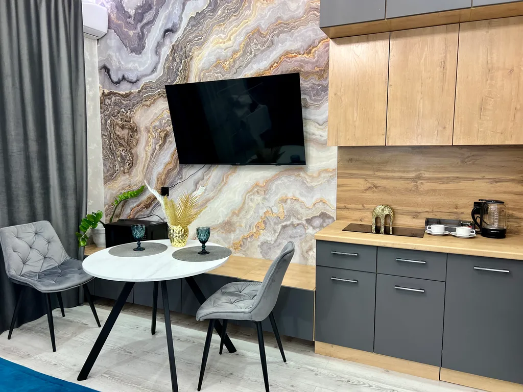 Новая квартира в центре города с видом на горы