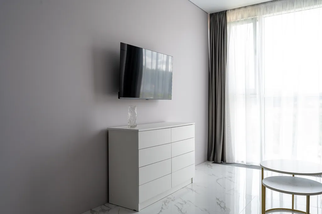 Светлая студия Real Apartments