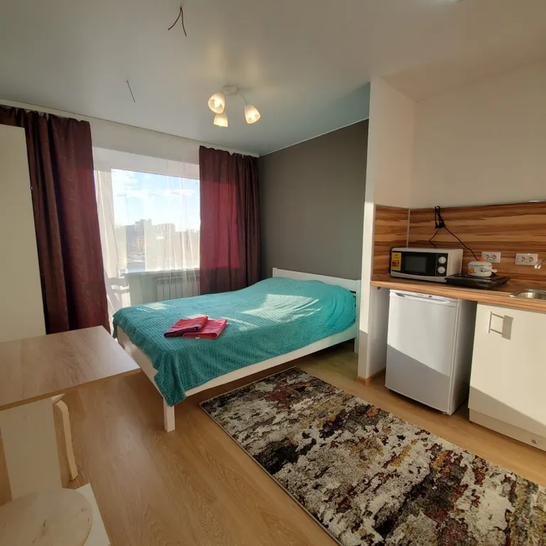 Апартаменты "Как дома" Уютная студия 9