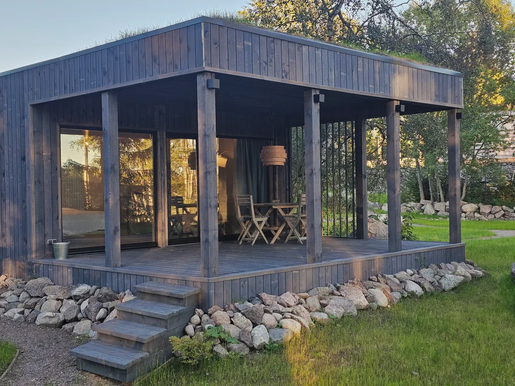 Вилла Nelli с видом на озеро и зоной барбекю среди каменной россыпи