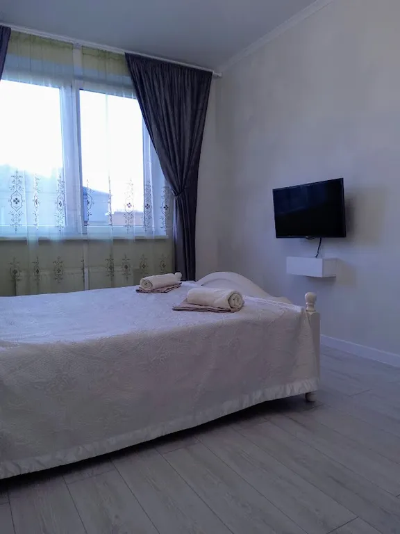 Новая квартира с солнечной террасой между морем и озером