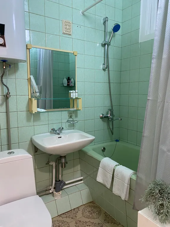 Квартира Классика в сердце города: уютная 2-комнатная квартира у моря — Гагра