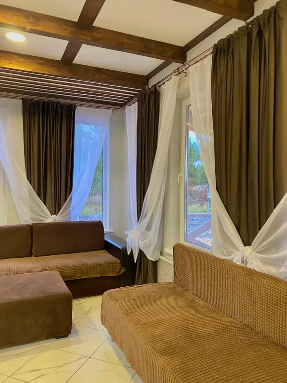 Загородный дом в лесу с купелью и баней у озера