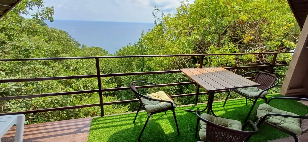 Комната Панорама в доме Остановка Море с видом на море и лес