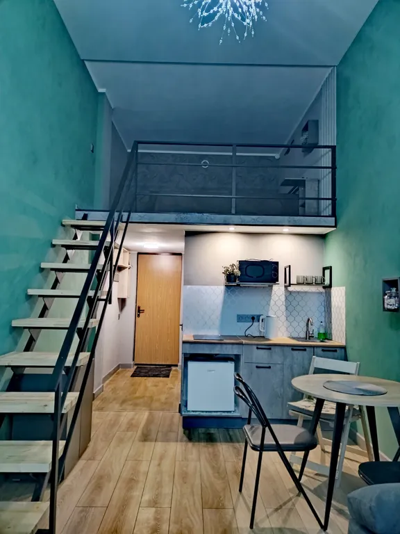 Уютная двухуровневая студия