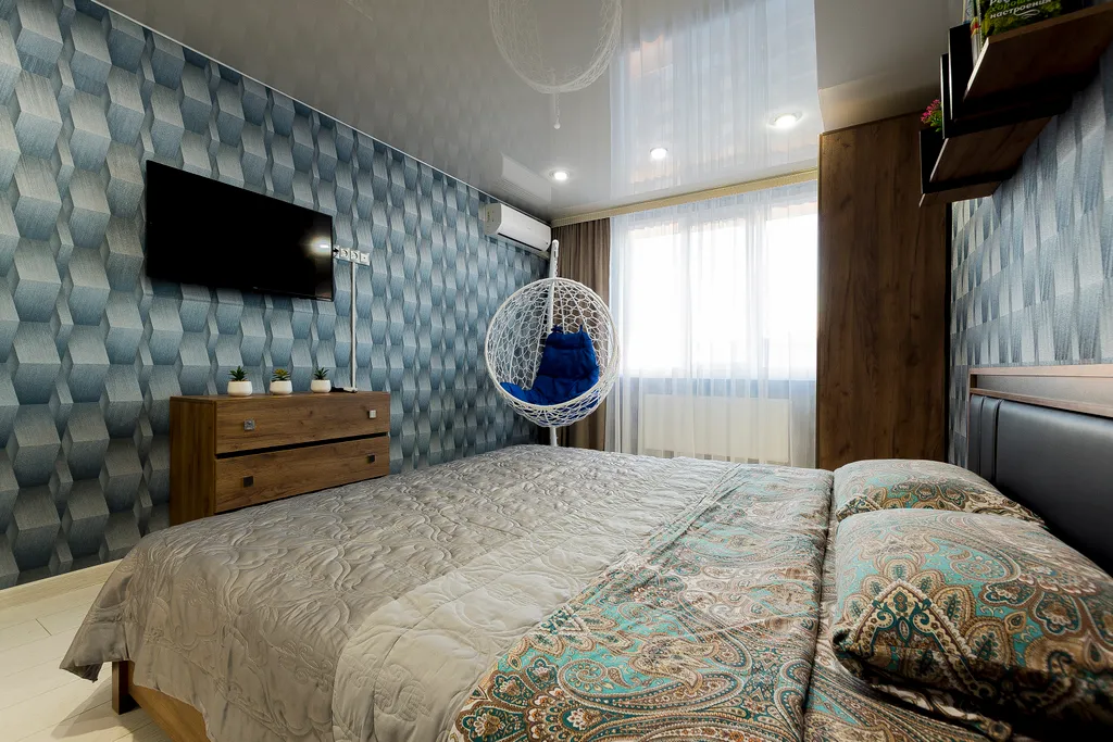 Уютная квартира в ЖК Паруса с подвесным креслом от Kravc Group