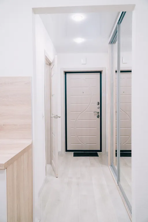 Милая студия для троих. Две кровати