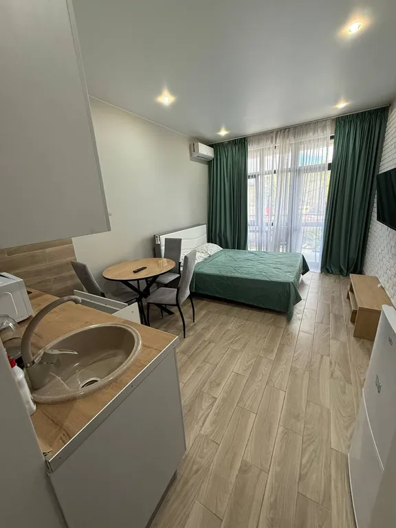 Апартаменты с двумя бассейнами на берегу моря