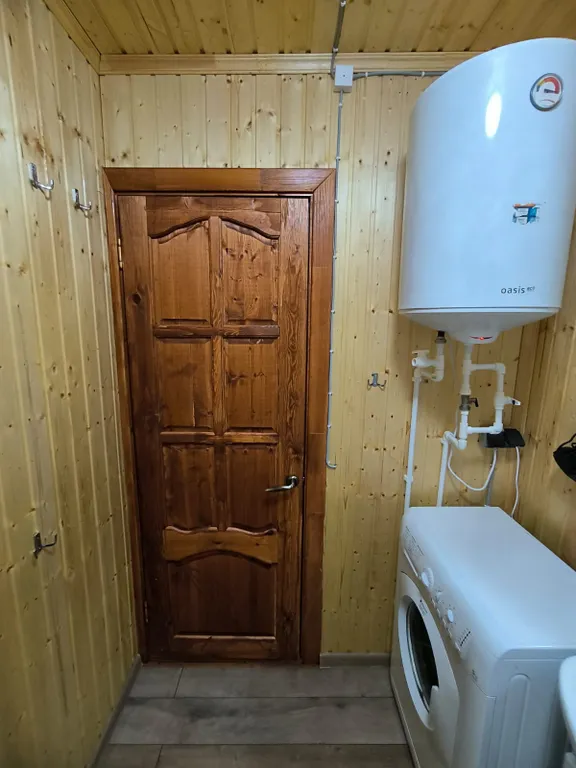 Новый бревенчатый дом в центре