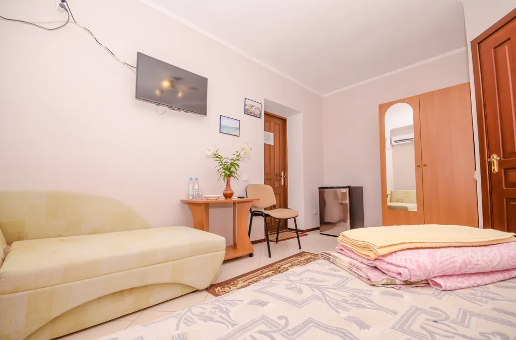 Двухместный Стандарт с двуспальной кроватью и дополнительным местом