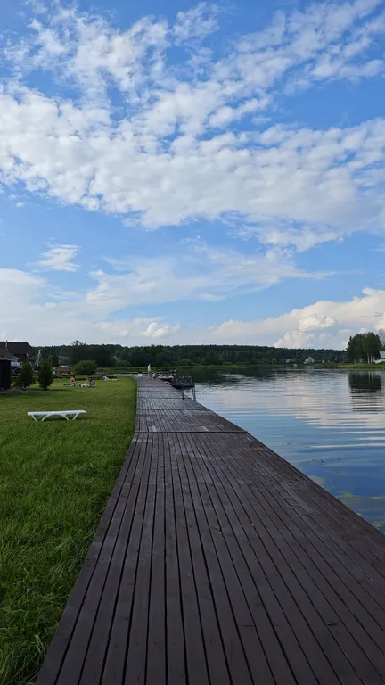 Дом у реки на закрытой охраняемой территории комплекса Гранд Ольгино