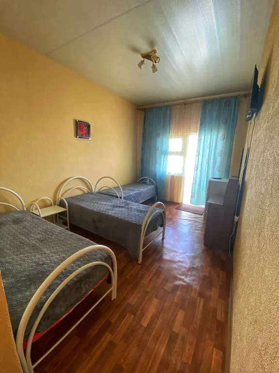 Трехместный номер с тремя отдельными кроватями