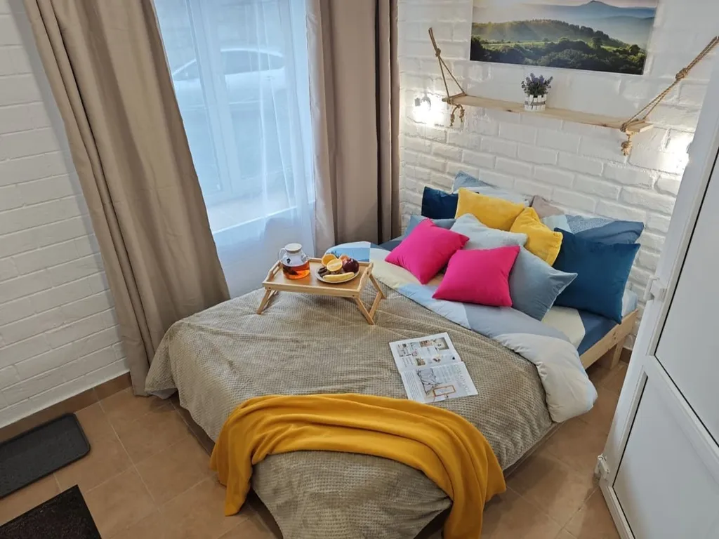 Уютная студия на двоих гостей с кроватью-трансформером