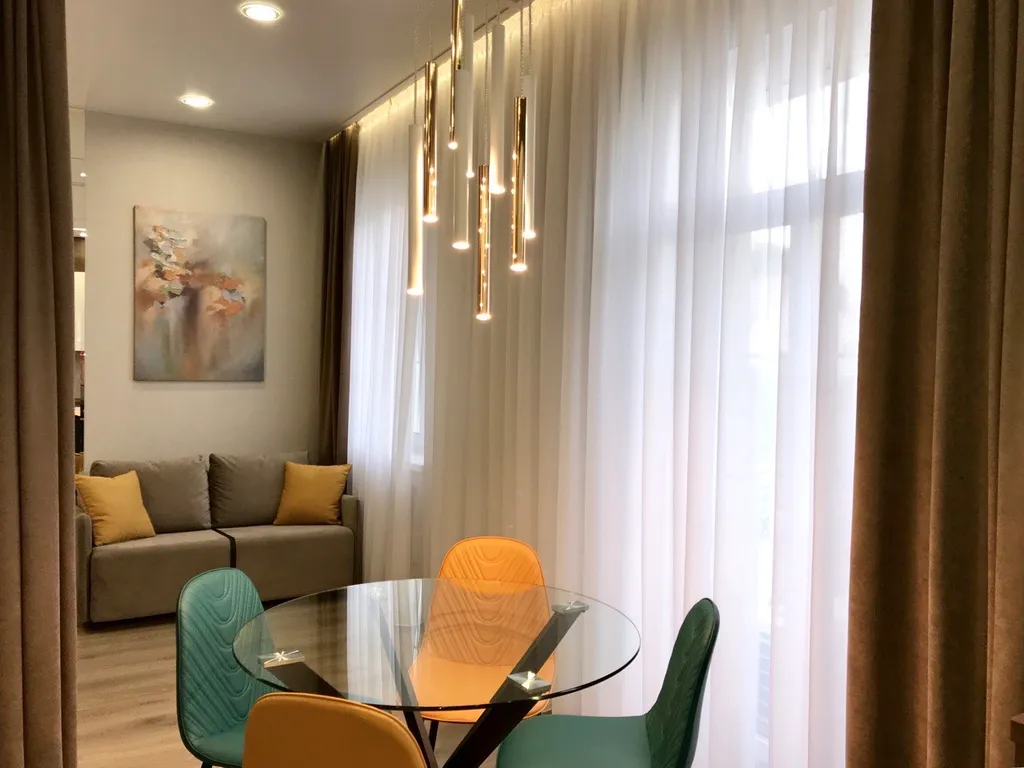 Новая квартира с подземным паркингом в центре