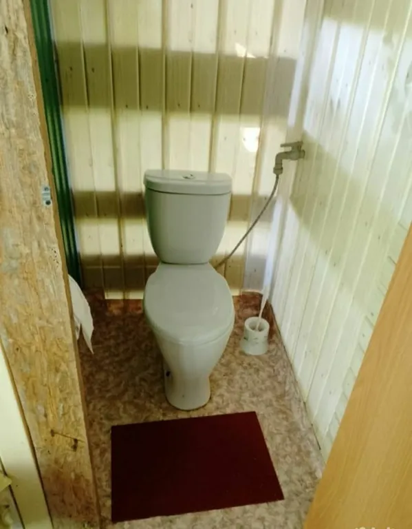 Комната у моря с видом на сад