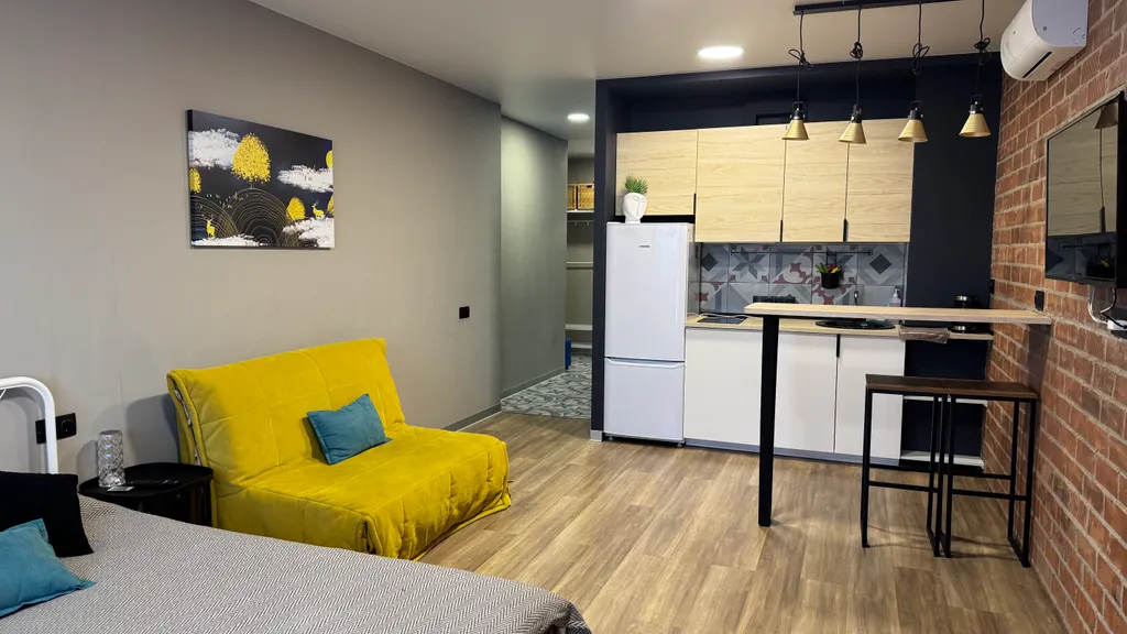 Большая студия в центре на 22 этаже с видом на реку и колесо обозрения