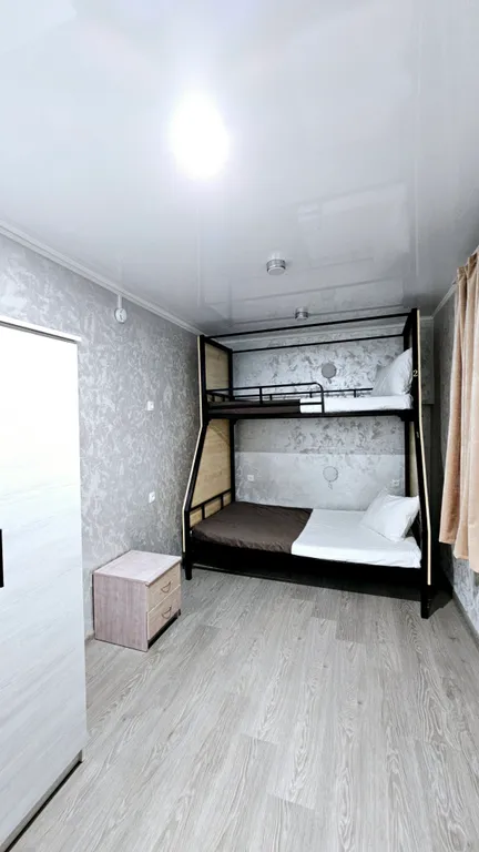 Койко-место в двухместном номер с полуторной и односпальной кроватями.