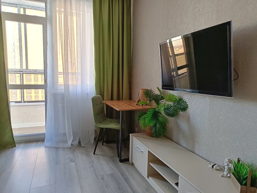 Светлая квартира рядом с ТЦ «Премьер» от Kravc Group