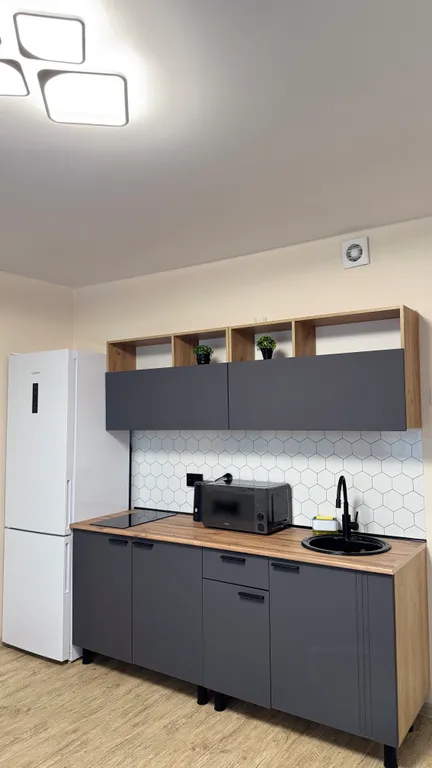 Стильная квартира-студия в новом доме микрорайона Парковый