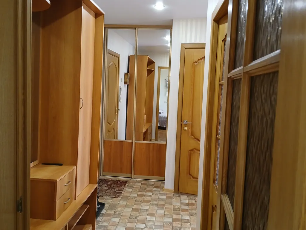 Двушка с видом на ёлочки.