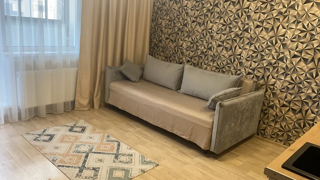 Уютная студия со спальней в парковом