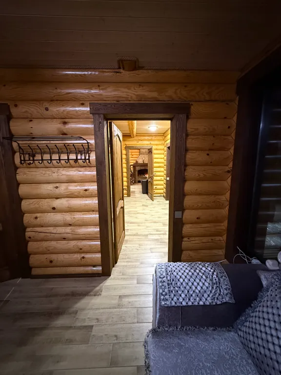 Двухэтажный дом из сруба а Теберде с баней с видом на горы и реку