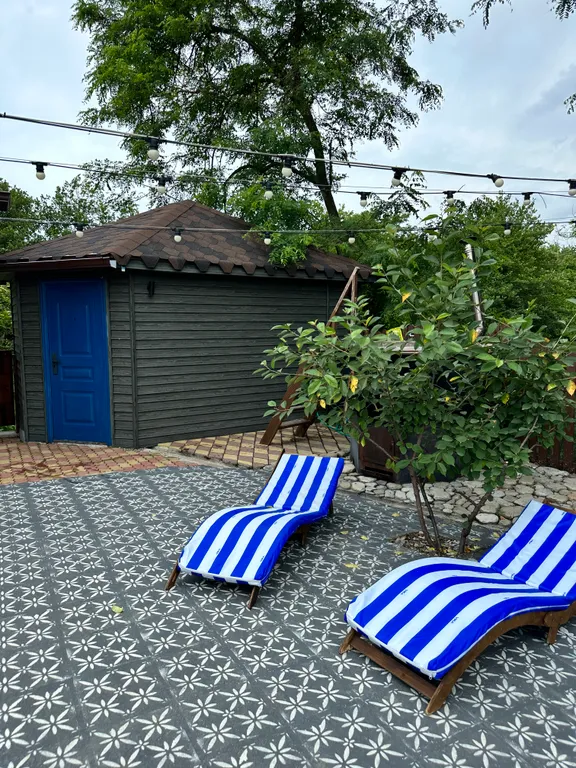 Загородный дом с бассейном и сауной