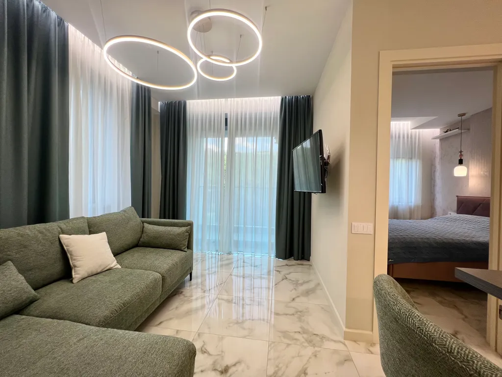 Апартаменты в вечнозелёном парке у моря