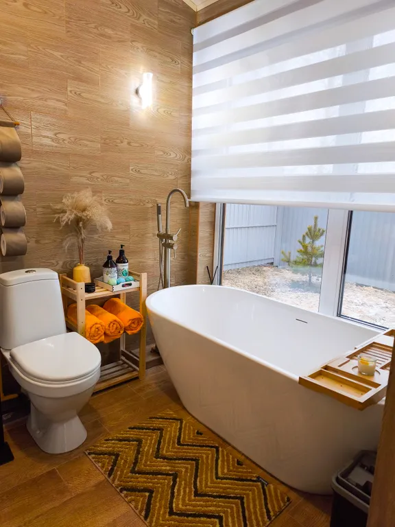 Дом шале с горячей купелью на террасе