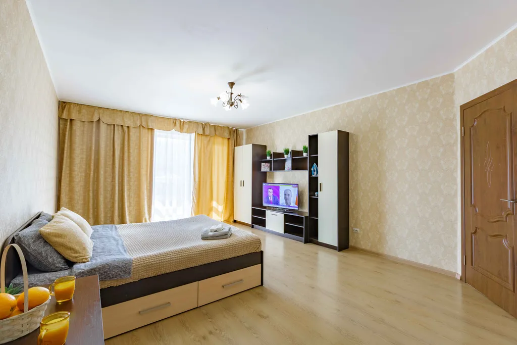 Светлая квартира с панорамными окнами в 10 минутах от парка в центре