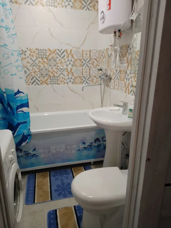 Уютная двухкомнатная квартира в центре города. Балкон застеклён