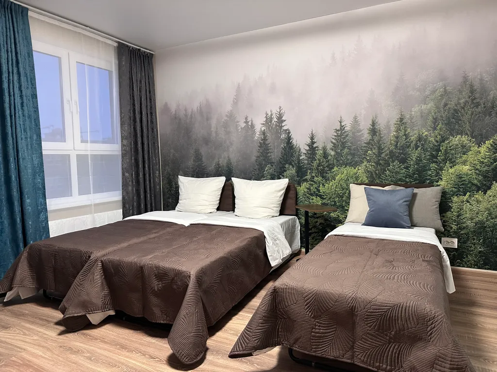 Студия с тремя раздельными кроватями