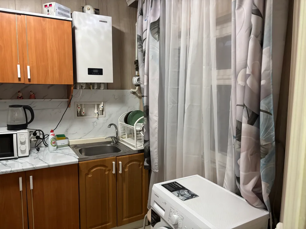 Уютная квартира в частном доме на первом этаже