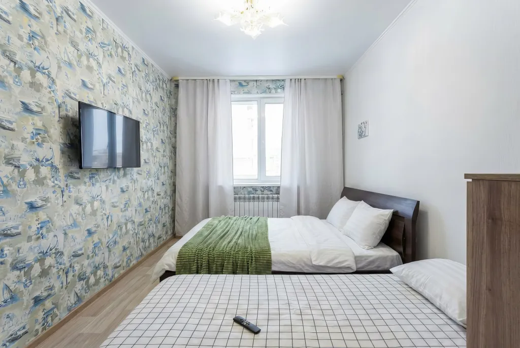 Просторные двухкомнатные апартаменты с балконом и видом на реку