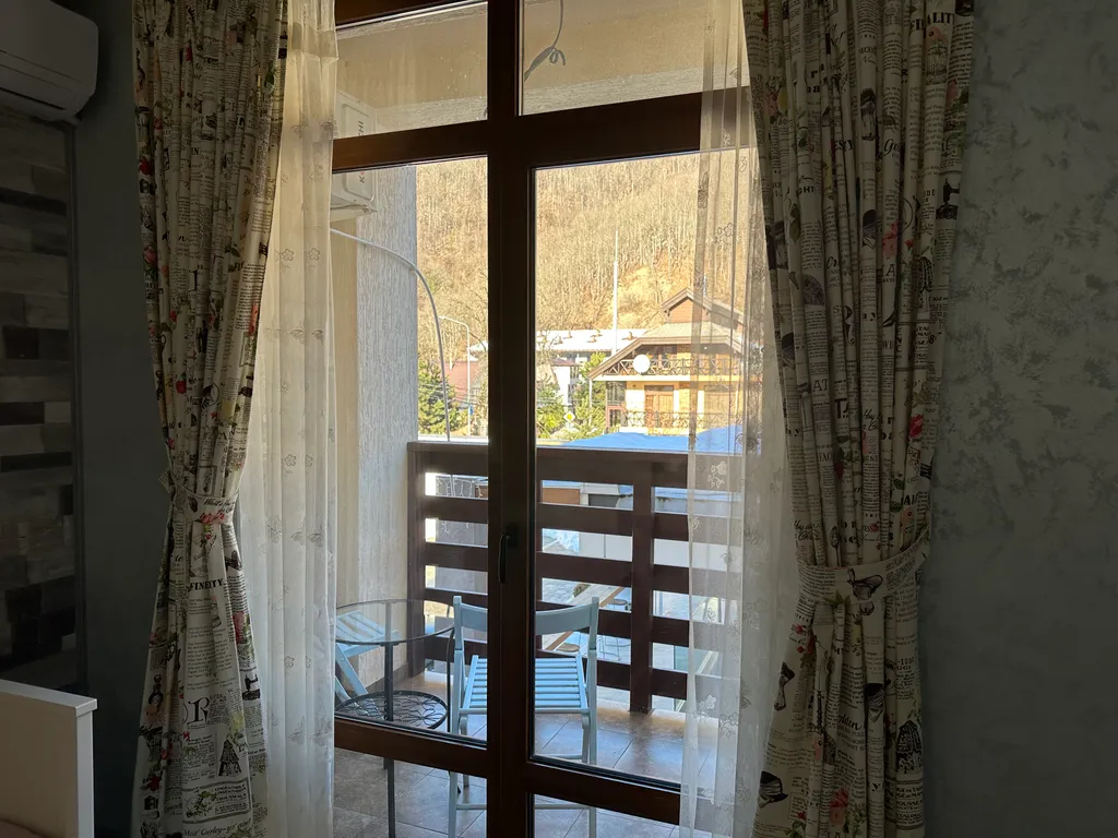 Уютная студия с видом на горы