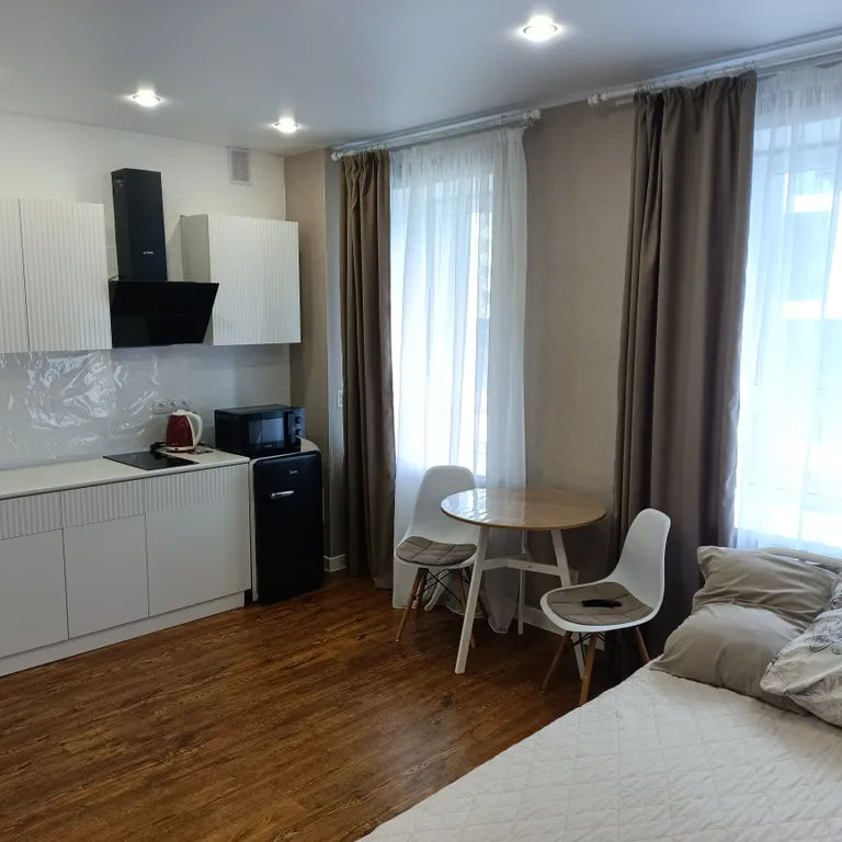 Уютная студия в зеленом массиве