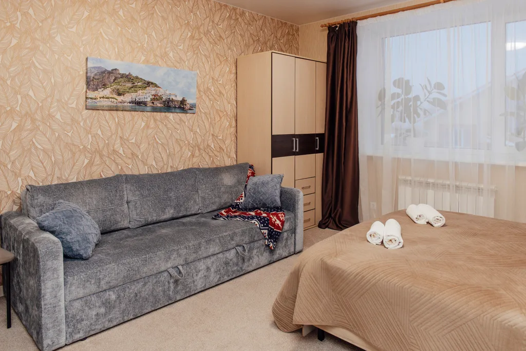 Семейный номер с двуспальной кроватью и раскладным диваном